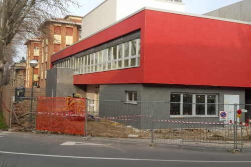 Facciata a Parma, serramenti e frangisoli